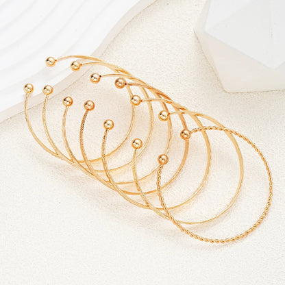 7-Piece Women’s Gold-Tone Punk Bracelet Set