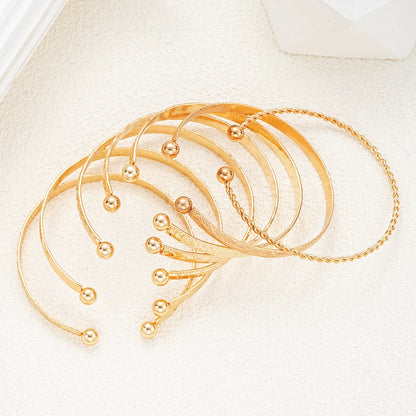 7-Piece Women’s Gold-Tone Punk Bracelet Set