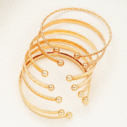 7-Piece Women’s Gold-Tone Punk Bracelet Set